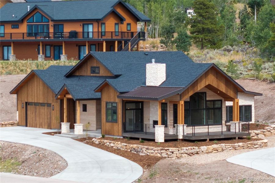 Front exterior of a new home in , Granby, CO, highlighting curb appeal (Image 25).