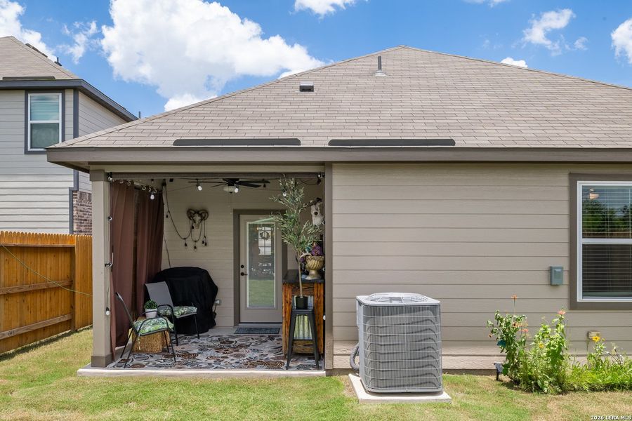 Exterior details and patio area of a home in Hightop Ridge, Converse (Image 22).
