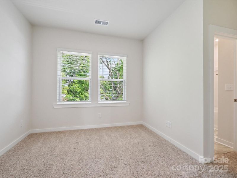 Spacious, unfurnished interior of a new home in Central Living at Craig, Charlotte (Image 22).