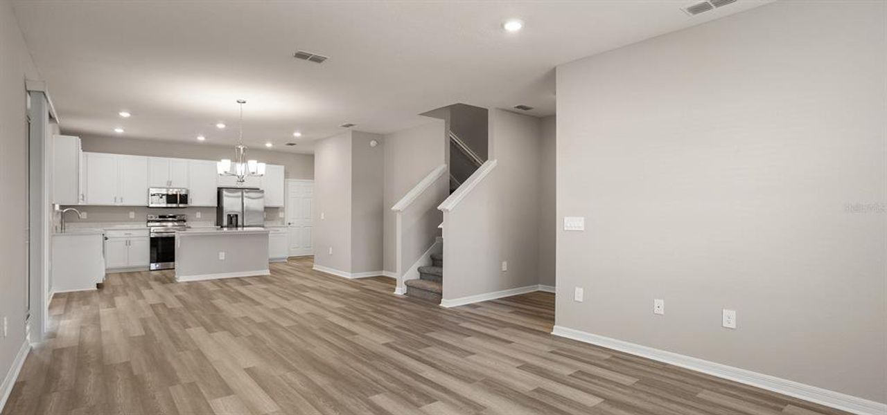 Spacious, unfurnished interior of a new home in Estates at Hickory Cove - Bungalows, St. Cloud (Image 9).