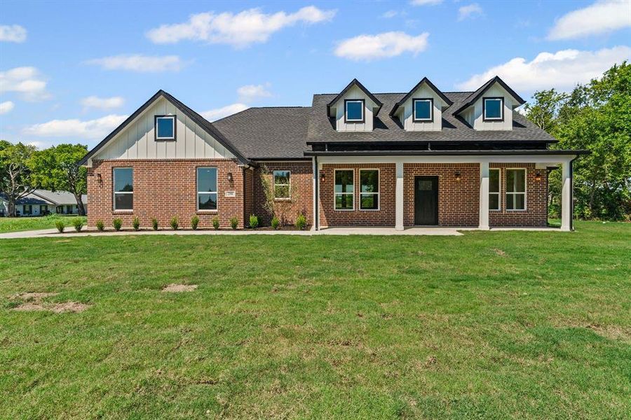 Front exterior of a new home in , Farmersville, TX, highlighting curb appeal (Image 2). Front exterior of a new home in , Farmersville, TX, highlighting curb appeal (Image 2).
