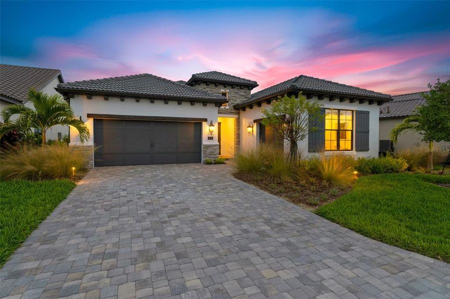 Front exterior of a new home in , Nokomis, FL, highlighting curb appeal (Image 2). Front exterior of a new home in , Nokomis, FL, highlighting curb appeal (Image 2).