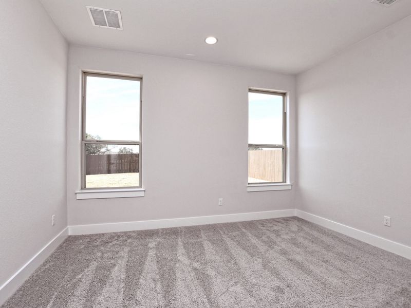 Representative unfurnished interior of a home built from the Emerald II by Giddens Homes in Riverstone, Georgetown (Image 31).