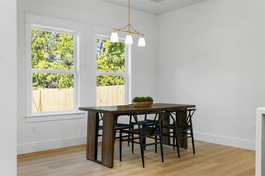 Dining room featuring light wood-type flooring