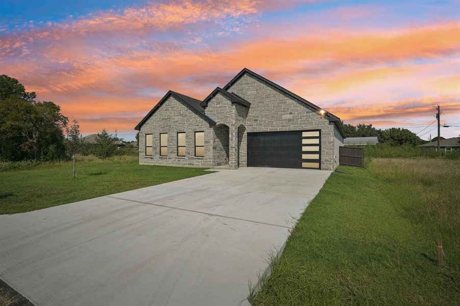 Front exterior of a new home in , Gun Barrel City, TX, highlighting curb appeal (Image 2). Front exterior of a new home in , Gun Barrel City, TX, highlighting curb appeal (Image 2).