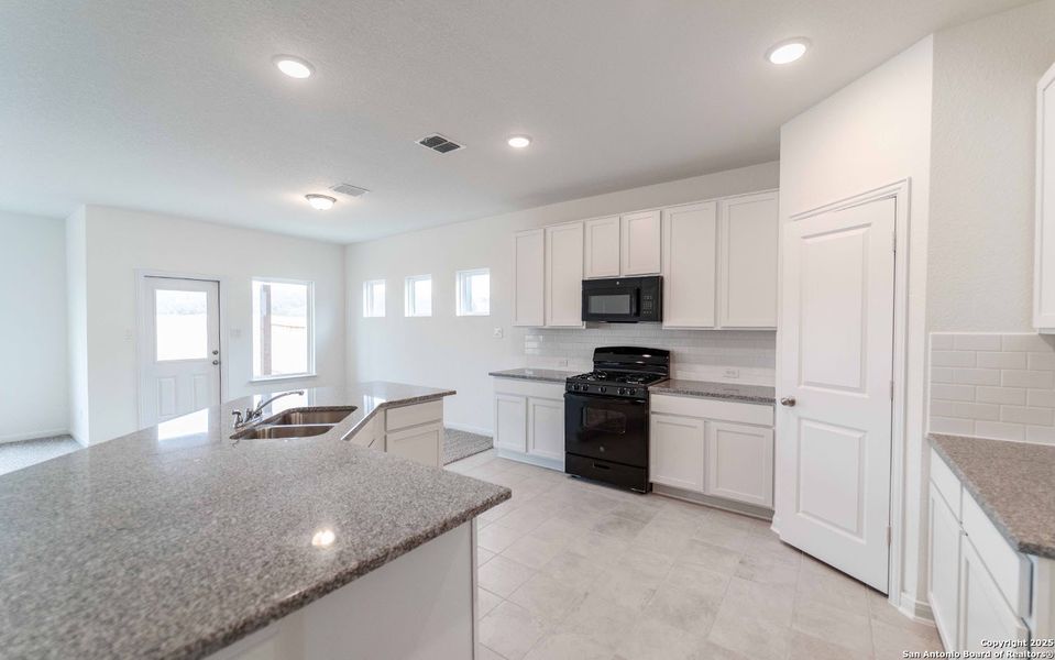Furnished interior view inside a new home in Hunter's Ranch, San Antonio (Image 4).