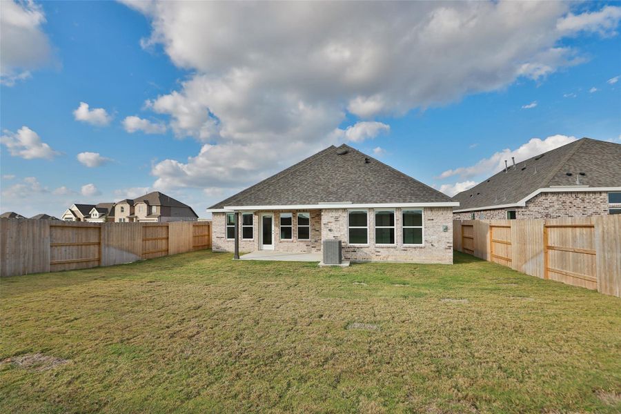 Exterior details and patio area of a home in Creekhaven, Iowa Colony (Image 25). Exterior details and patio area of a home in Creekhaven, Iowa Colony (Image 25).