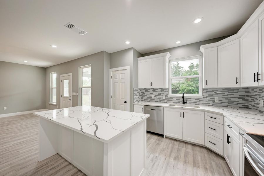 Furnished interior view inside a new home in , Paige (Image 12).