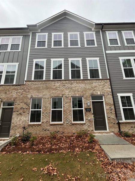 Front exterior of a new home in Galloway Towns, Charlotte, NC, highlighting curb appeal (Image 1).
