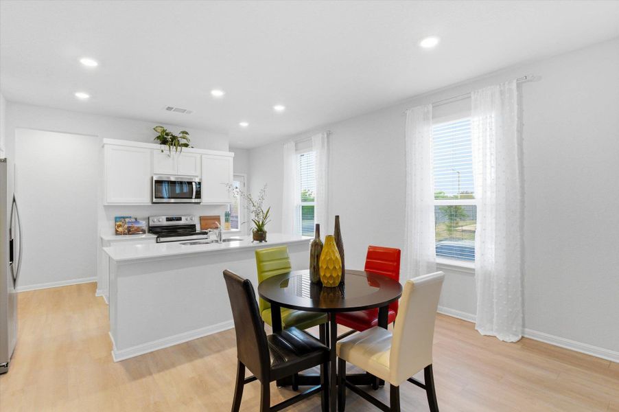 Dining area with room to have counter stools at the kitchen island