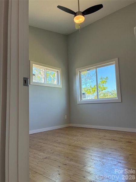 Each bedroom has a fan, individual mini split, and hardwoods. Loads of natural light.