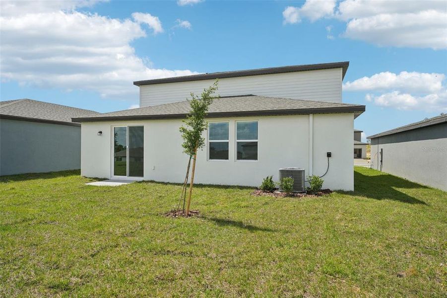 Exterior details and patio area of a home in Benton Hills - Classic Series, Brooksville (Image 4).