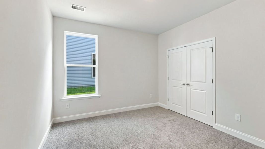 Spacious, unfurnished interior of a new home in Rutledge Estates, Woodruff (Image 27).