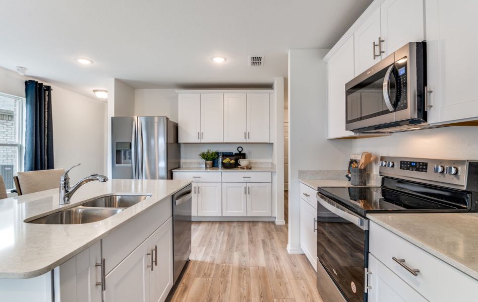 Abundant cabinet space in kitchen