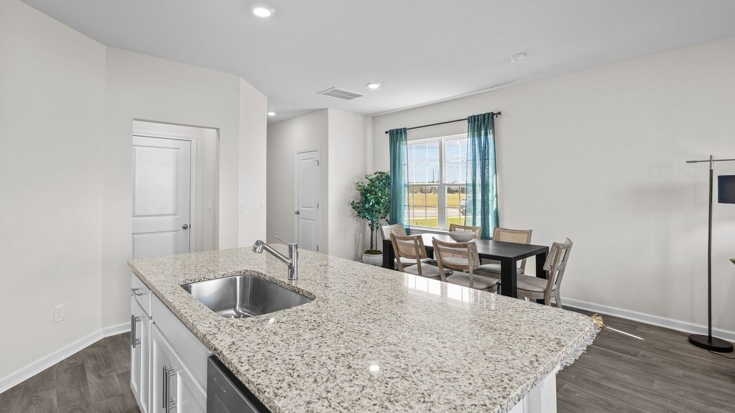 Furnished interior view inside a new home in The Townes at Ridgewood Farms, Winterville (Image 7).