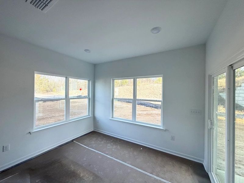 Breakfast Area featuring AW Collection® Oxford - Sunlit comfort to start the day.