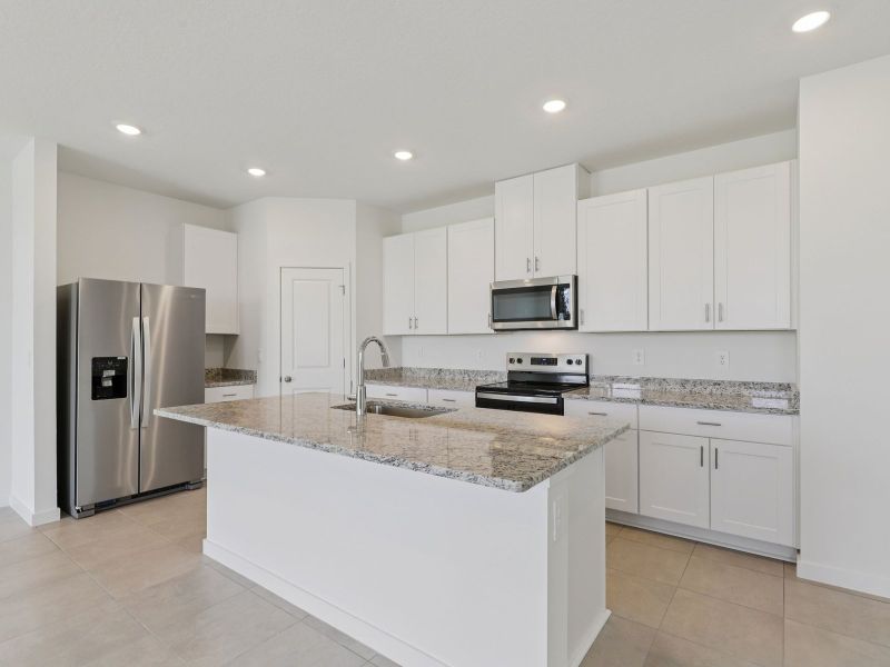 Furnished interior view inside a new home in Lakes at Bella Lago - Signature Series, Green Cove Springs (Image 5).