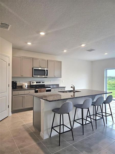 Furnished interior view inside a new home in , Haines City (Image 4).