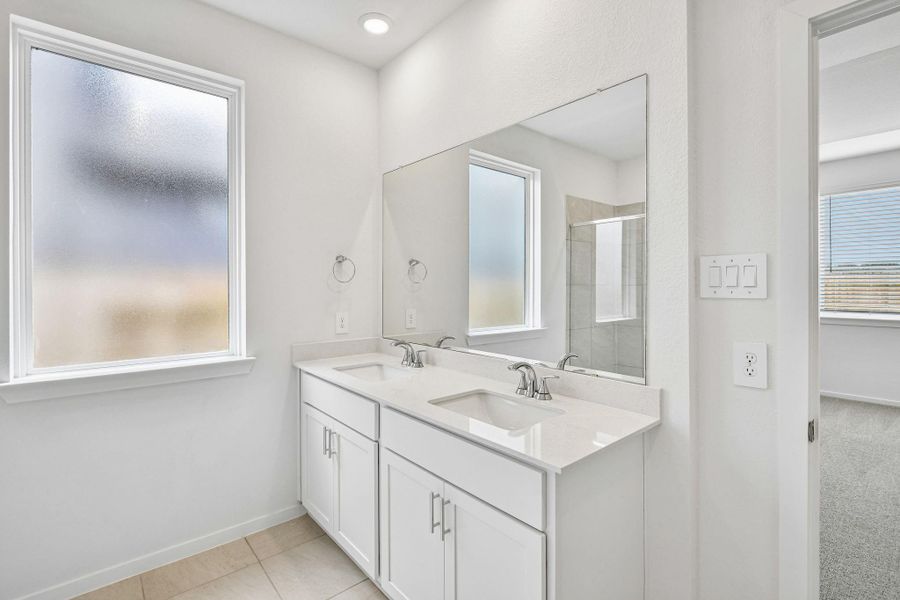 Furnished interior view inside a new home in Riviera Pines - Premier Series, Huffman (Image 11).
