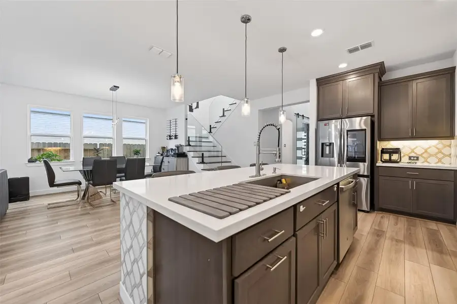 Furnished interior view inside a new home in Avalon at Cypress, Cypress (Image 6).