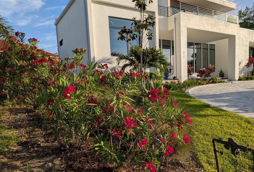 Front exterior of a new home in , Sarasota, FL, highlighting curb appeal (Image 27).