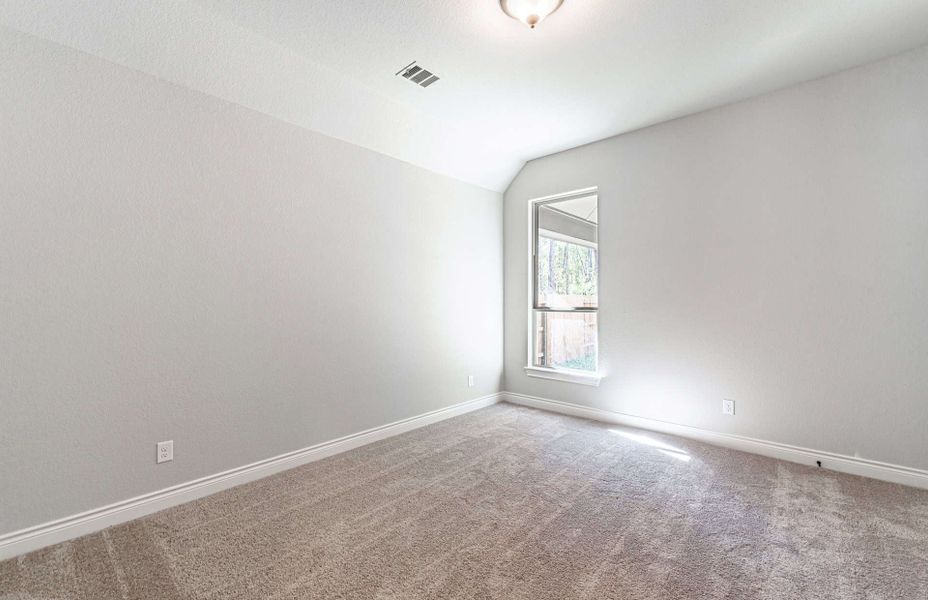 Representative unfurnished interior of a home built from the 3358 by Ravenna Homes in Artavia 70′, Conroe (Image 54).