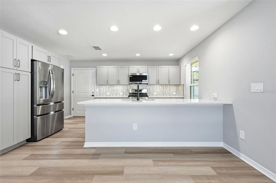 Furnished interior view inside a new home in , Okahumpka (Image 11). Furnished interior view inside a new home in , Okahumpka (Image 11).