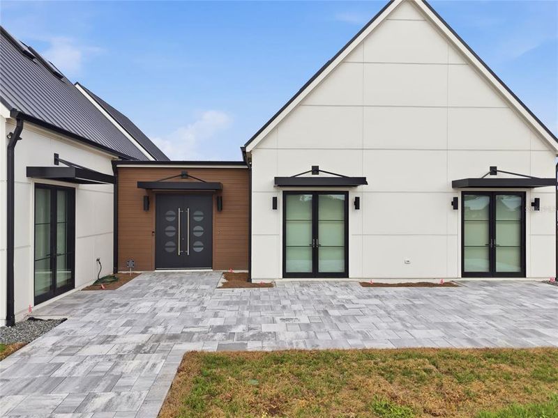 Front exterior of a new home in , Alachua, FL, highlighting curb appeal (Image 24).
