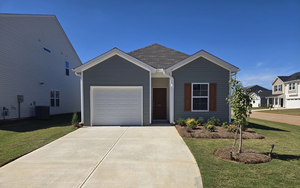 Front exterior of a new home in Wingate, Inman, SC, highlighting curb appeal (Image 1). Front exterior of a new home in Wingate, Inman, SC, highlighting curb appeal (Image 1).