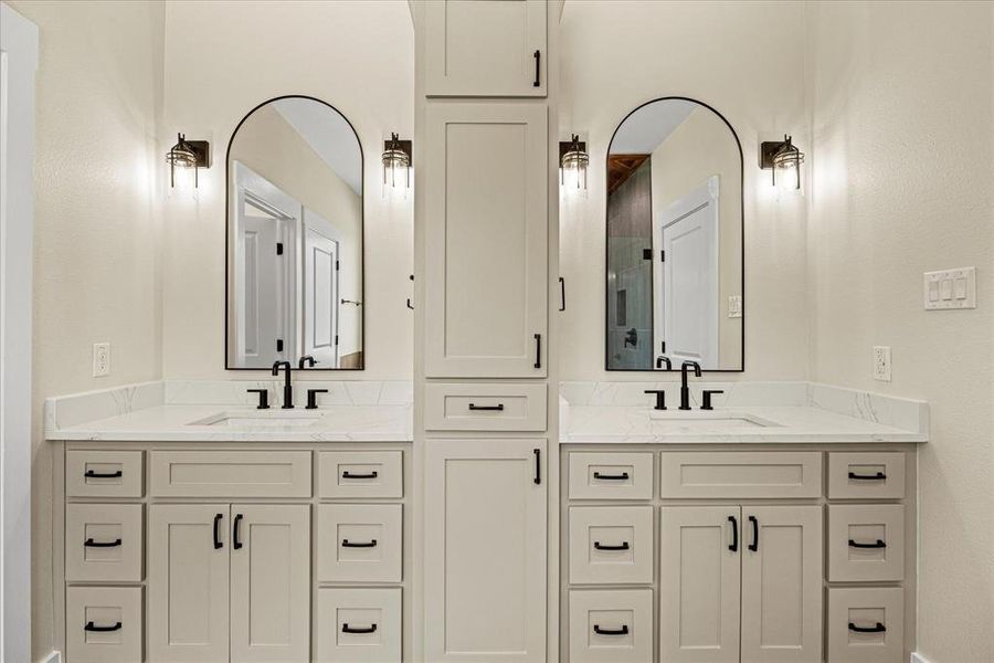 Full bath featuring a double vanity