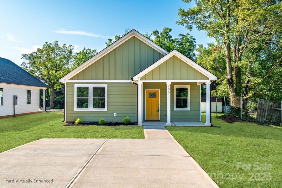 Front exterior of a new home in , East Spencer, NC, highlighting curb appeal (Image 24).