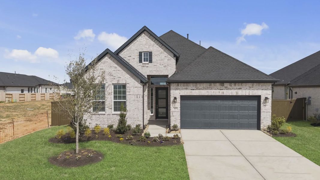 Front exterior of a new home in Attwater 55s, Waller, TX, highlighting curb appeal (Image 18).