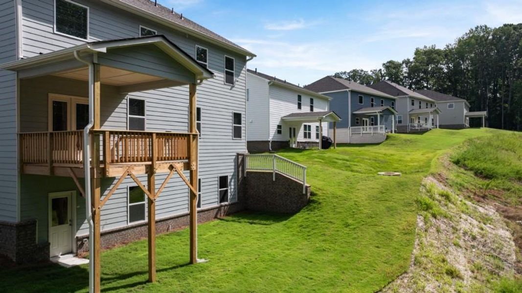 Front exterior of a new home in Butner Estates, South Fulton, GA, highlighting curb appeal (Image 7).