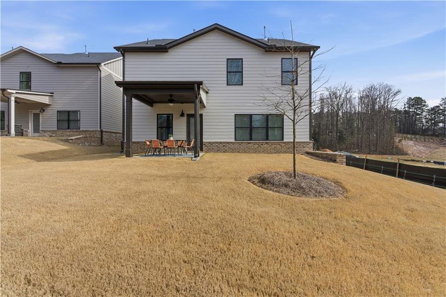 Exterior details and patio area of a home in Meadow Pines, Dallas (Image 28).