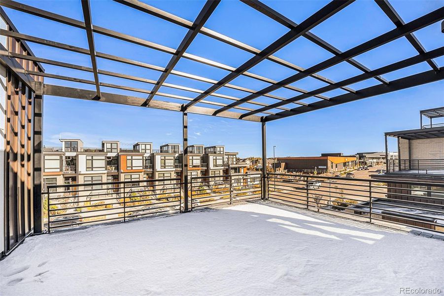 Large rooftop deck off loft with fireplace and mountain views