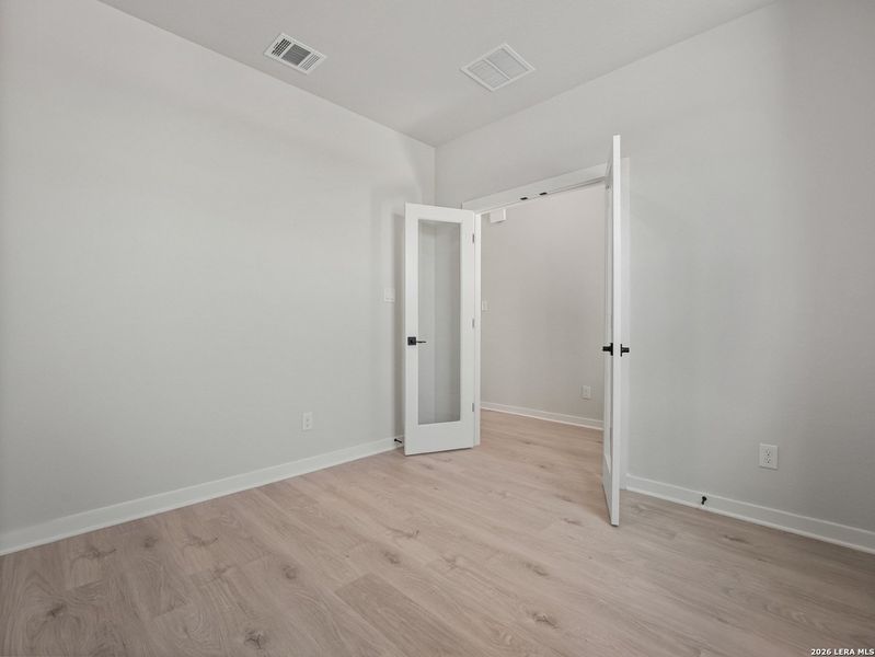 Spacious, unfurnished interior of a new home in Hunter's Ranch, San Antonio (Image 17).