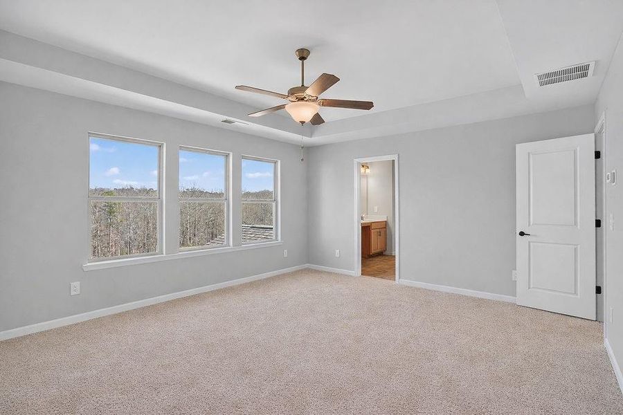 Spacious, unfurnished interior of a new home in Chimney Oaks Overlook, Homer (Image 19).