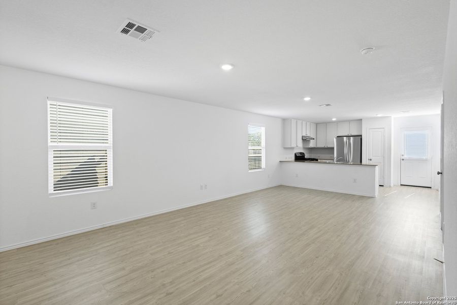 Spacious, unfurnished interior of a new home in Ruby Crossing: Cottage Collection, San Antonio (Image 13).