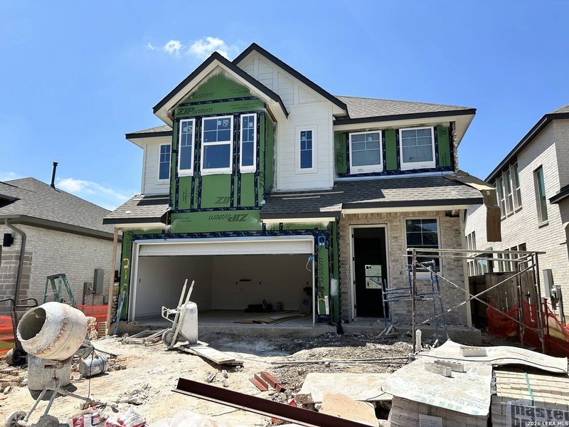 In-progress construction of a new home in Legacy at Lake Dunlap, New Braunfels, TX (Image 18).