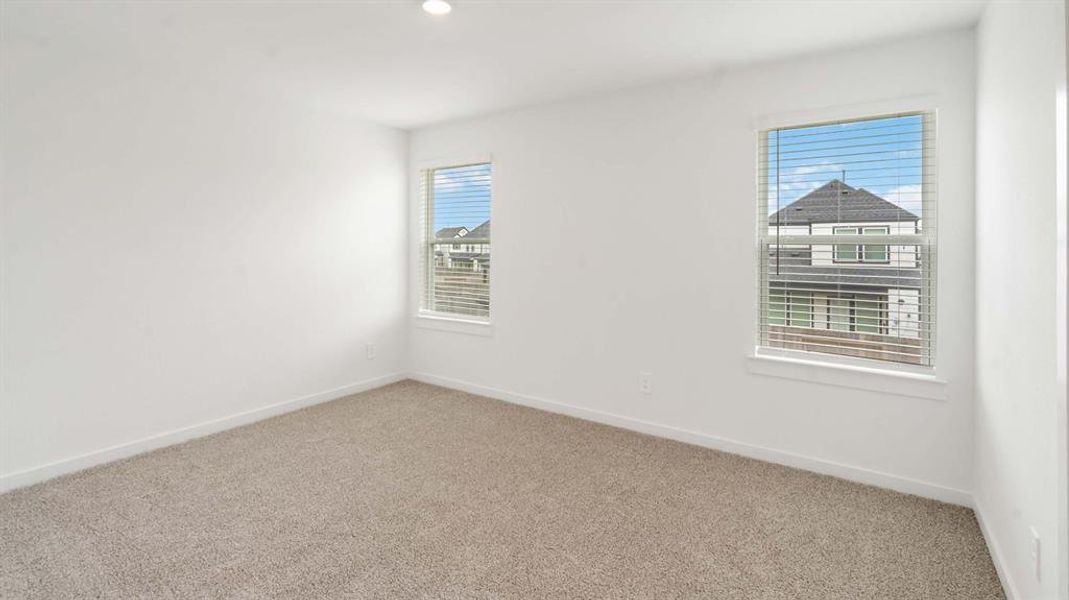 Unfurnished room with carpet floors and recessed lighting
