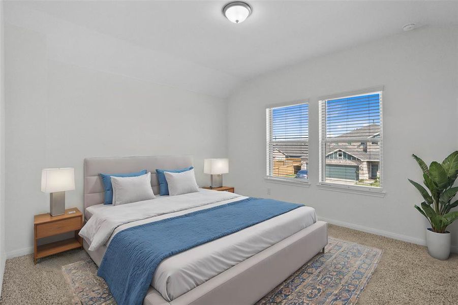 Secondary bedroom features plush carpet, neutral paint, high ceilings, lighting, and large windows with privacy blinds.