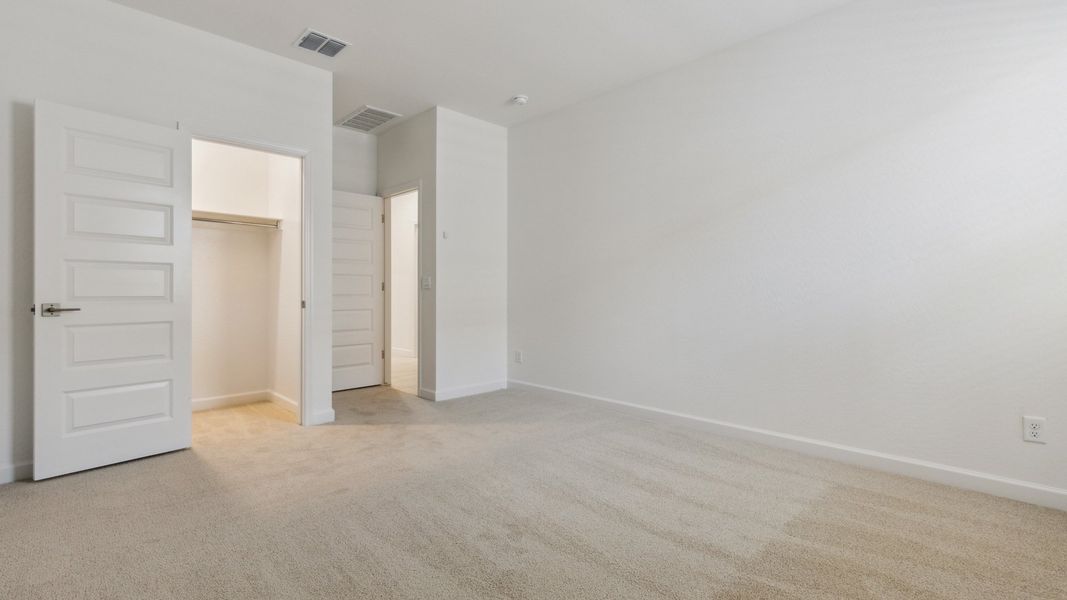 Spacious, unfurnished interior of a new home in Zanjero Pass, Waddell (Image 24).