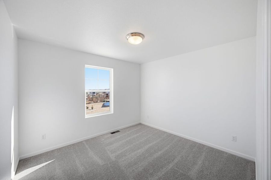 Spacious, unfurnished interior of a new home in The Town Collection at Independence, Elizabeth (Image 17).