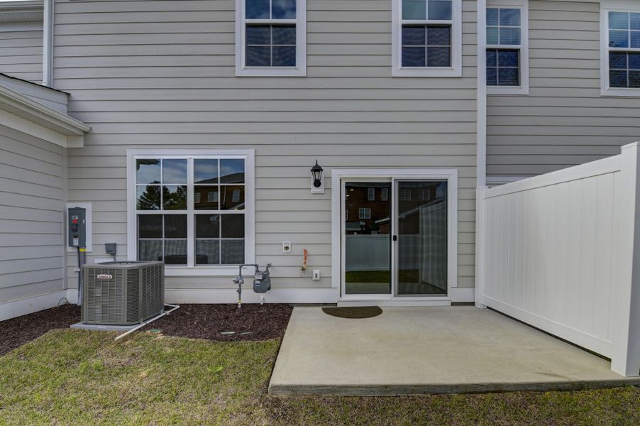 Exterior details and patio area of a home in Lake Carolina Townhomes, Columbia (Image 30).