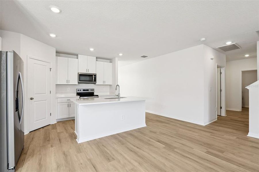 Furnished interior view inside a new home in Benton Hills - Classic Series, Brooksville (Image 7). Furnished interior view inside a new home in Benton Hills - Classic Series, Brooksville (Image 7).