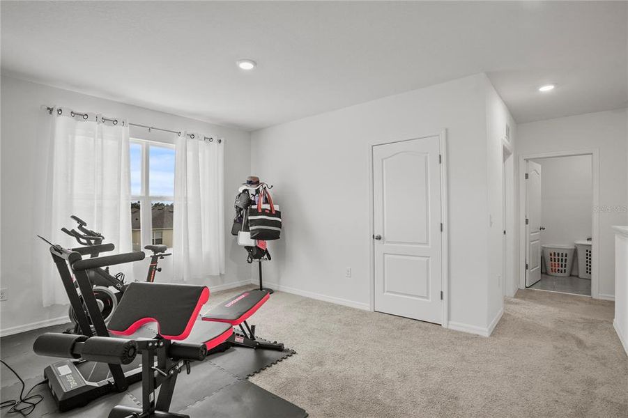Upstairs Loft that is used as a gym can be a 2nd family room or office Upstairs Loft that is used as a gym can be a 2nd family room or office