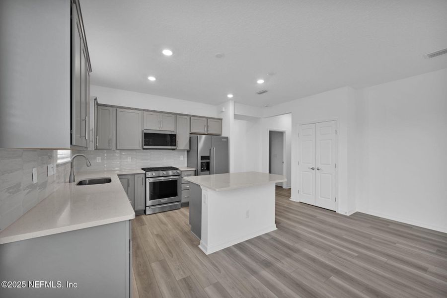 Furnished interior view inside a new home in Del Webb Wildlight, Yulee (Image 6).
