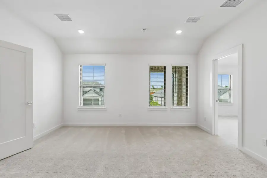 Media Room in the Claret home plan by Trophy Signature Homes – REPRESENTATIVE PHOTO