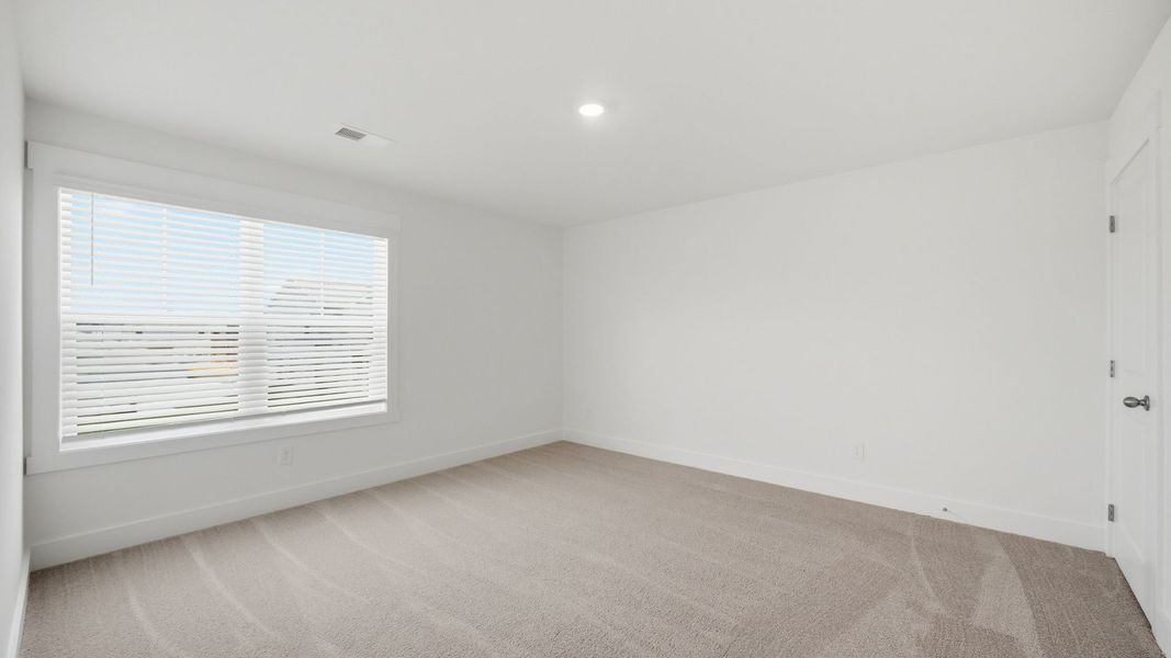 Spacious, unfurnished interior of a new home in The Hideaway at Fox Meadows, Bluff City (Image 17).