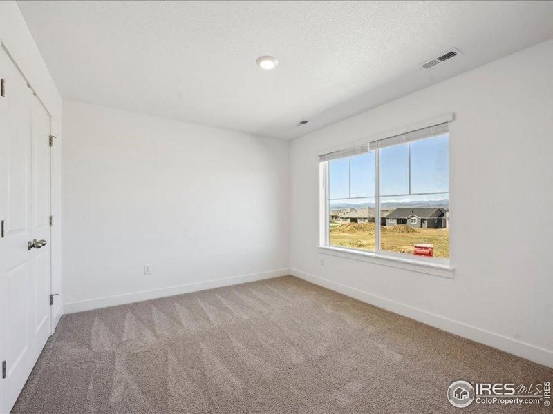 Spacious, unfurnished interior of a new home in Vantage, Berthoud (Image 19).
